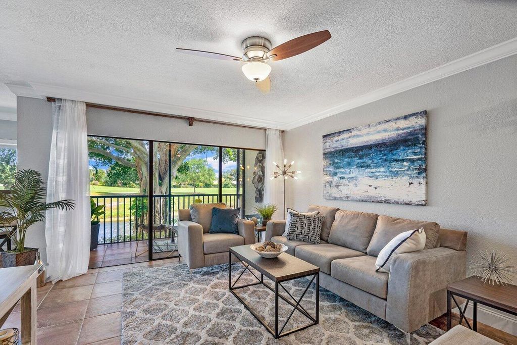 Photo of 501 Greensward Lane #101-C, Delray Beach, FL 33445 (MLS # R11159366)