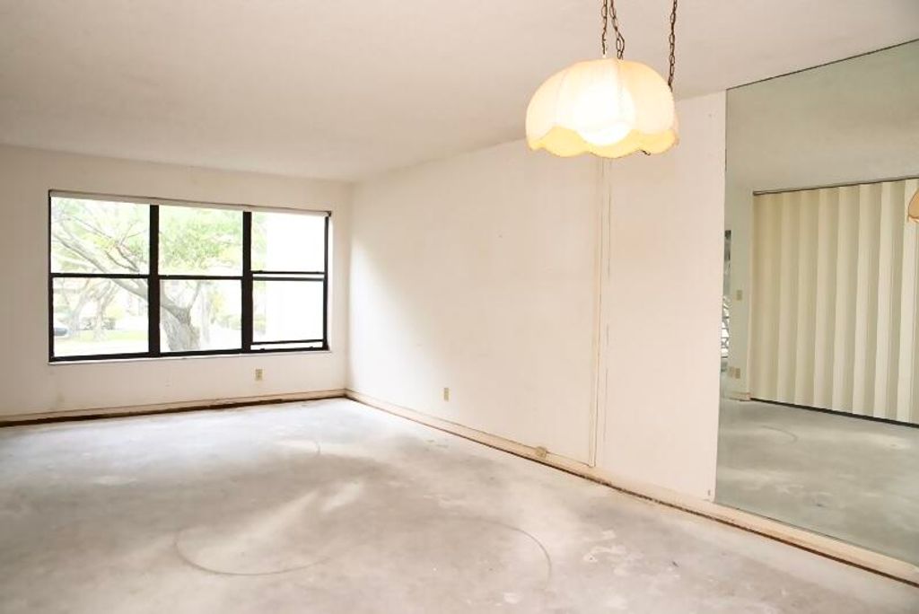Photo of 2302 S Cypress Bend Drive #209, Pompano Beach, FL 33069 (MLS # R10948477)