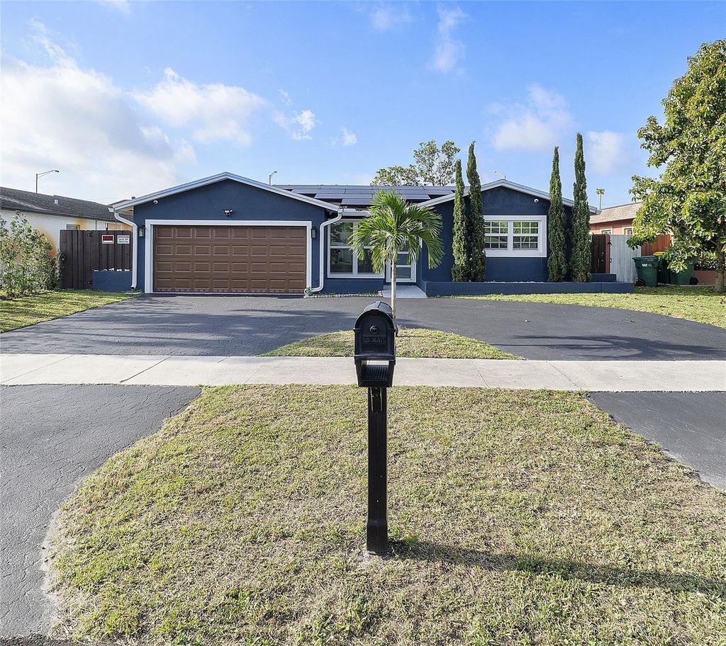 Photo of 5820 NW 56th Place, Tamarac, FL 33319 (MLS # B26024378)