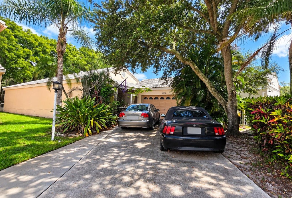 Photo of 9538 NW 8th Circle, Plantation, FL 33324 (MLS # B26078610)