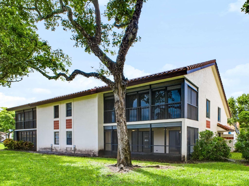 Photo of 10772 Bahama Palm Way #101, Boynton Beach, FL 33437 (MLS # B26094475)