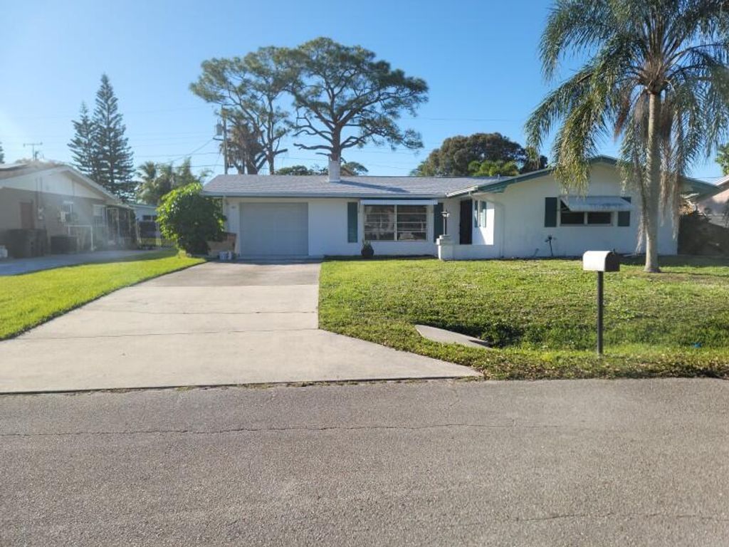 Photo of 408 E Coconut Avenue, Port Saint Lucie, FL 34952 (MLS # R11150934)