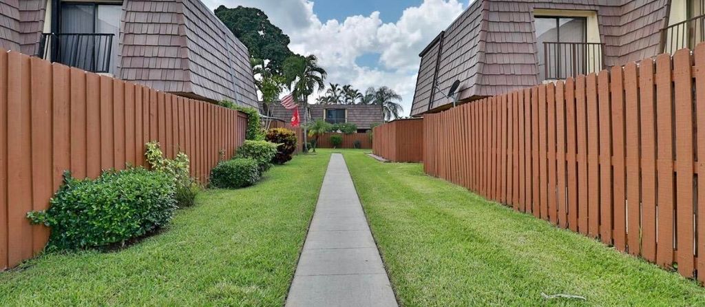 Photo of 1034 Springdale Circle, Palm Springs, FL 33461 (MLS # R11158787)