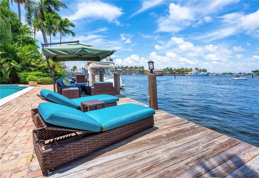 Among the Widest Views in Fort Lauderdale. SW Exposure: City & Intracoastal Panoramas. 130 Ft Straight Line Dock fits 120 Ft Vessel. Canal approx 120 Ft in Width and should Accommodate most wide beam Yachts. Boaters & Builders Have Five Ft Side Setbacks. Palm Beach Style Traditional Home. Great Room: 15 Ft Coffer Ceilings, Wood Burning Fireplace. Entrance Gallery Measures 8'x33' with 12 Ft Beam Ceiling. Master BR: 10.5 Ft Tray Ceilings, Walk-In Closet, Walls of Glass View Water. Master Bath: Spa Tub, Walk-In Shower, Two Wash Basins. Octagon Stair Tower is 18 Ft High with Wood Beam Ceiling. Family Rm/Library: 11 Ft Ceilings & Walls of Glass View Water. Approx 35 Ft Heated Pool. Walled & Gated Entrance with Chicago Brick Motor Court. Two Bedrooms on Entry Level & Two Bedrooms Up.