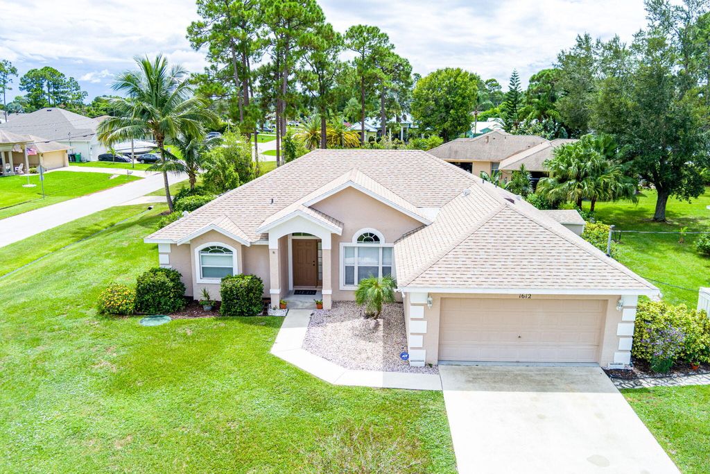 Photo of 1612 SW Penrose Avenue, Port Saint Lucie, FL 34953 (MLS # R11123609)