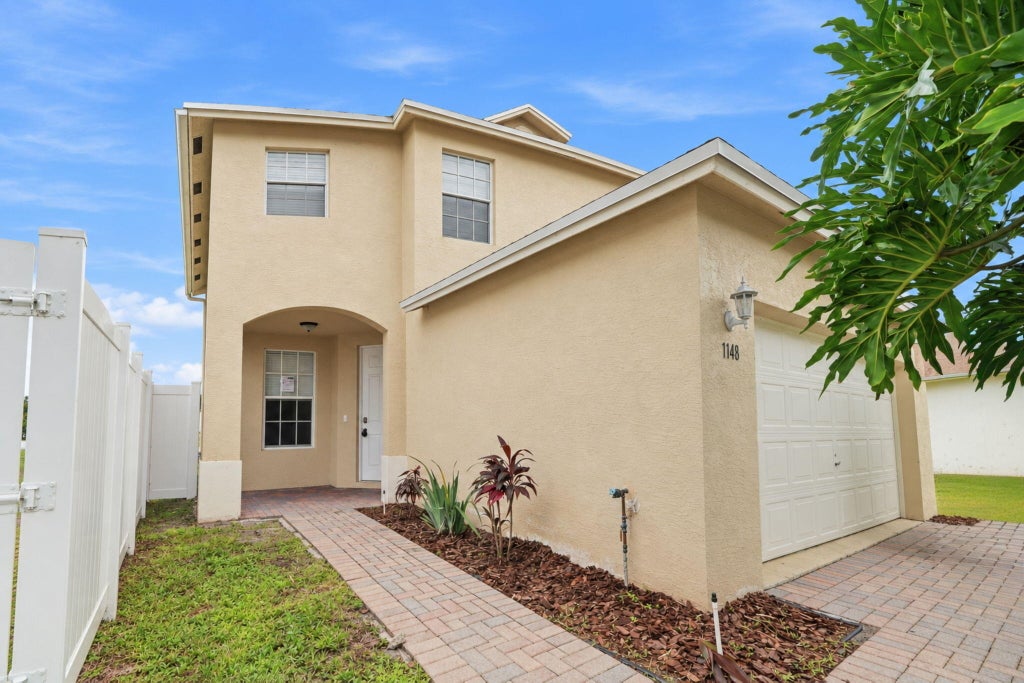 Photo of 1148 Cala Lily Cove, West Palm Beach, FL 33415 (MLS # B26081895)