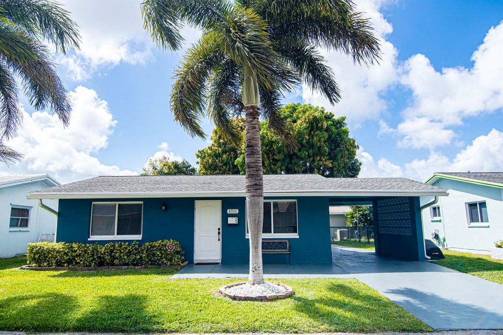 Photo of 5711 NW 48th Ter, Tamarac, FL 33319 (MLS # B26001136)