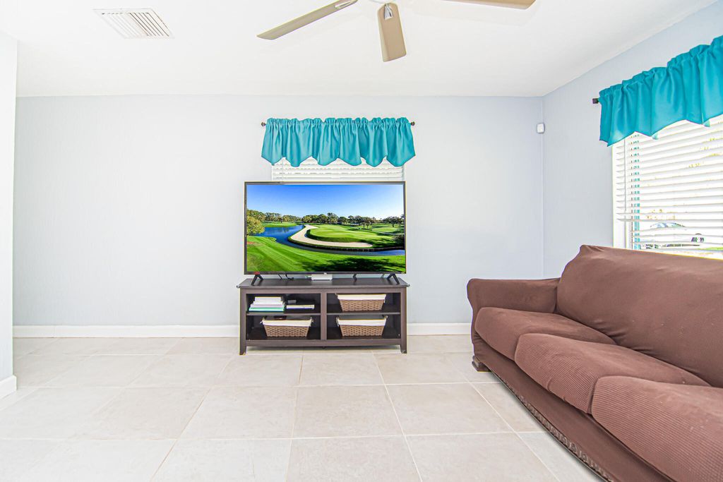 Photo of 5711 NW 48th Ter, Tamarac, FL 33319 (MLS # B26001136)