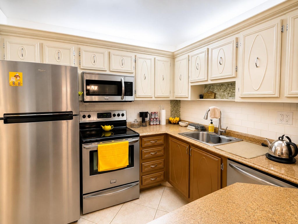 Photo of 5680 SW 3rd Place #106, Margate, FL 33068 (MLS # B26071597)