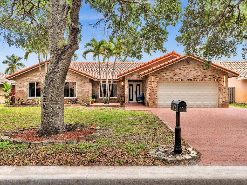 Photo of 5165 NW 99th Way, Coral Springs, FL 33076 (MLS # B26015000)