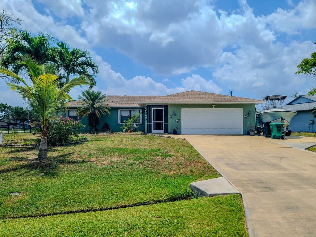Photo of 2098 SW Libra Lane, Port Saint Lucie, FL 34984 (MLS # R11004866)