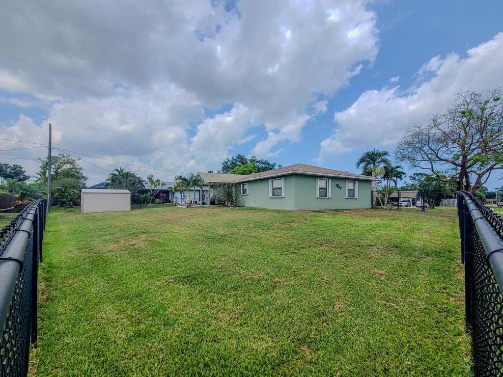 Photo of 2098 SW Libra Lane, Port Saint Lucie, FL 34984 (MLS # R11004866)
