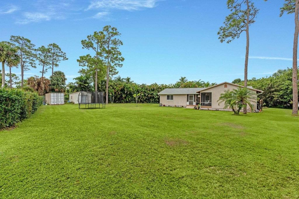 Photo of 14895 24th Circle N, Loxahatchee, FL 33470 (MLS # R11165593)
