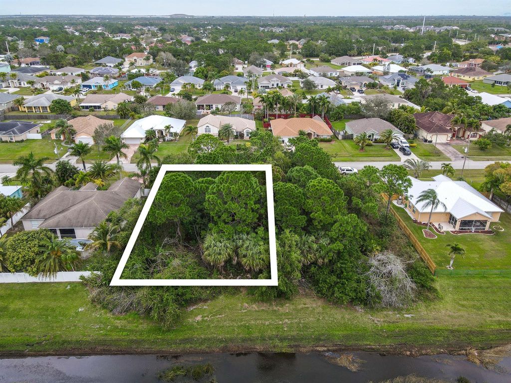 Photo of 5819 NW Zenith Drive, Port Saint Lucie, FL 34986 (MLS # R10953102)