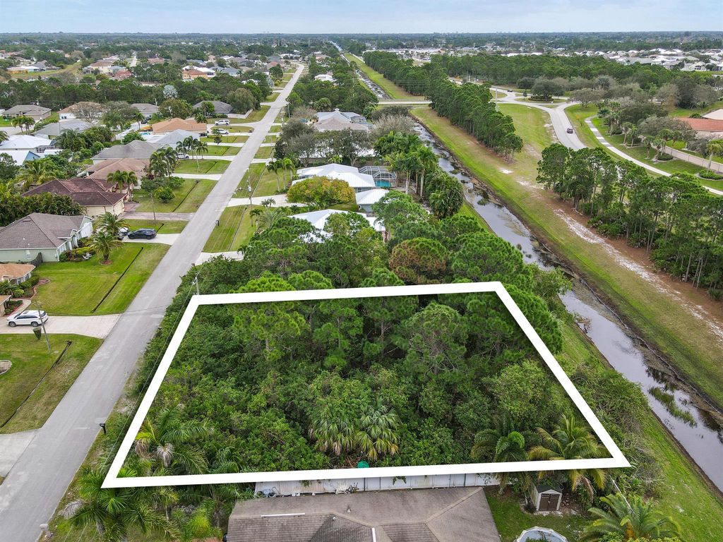 Photo of 5819 NW Zenith Drive, Port Saint Lucie, FL 34986 (MLS # R10953102)