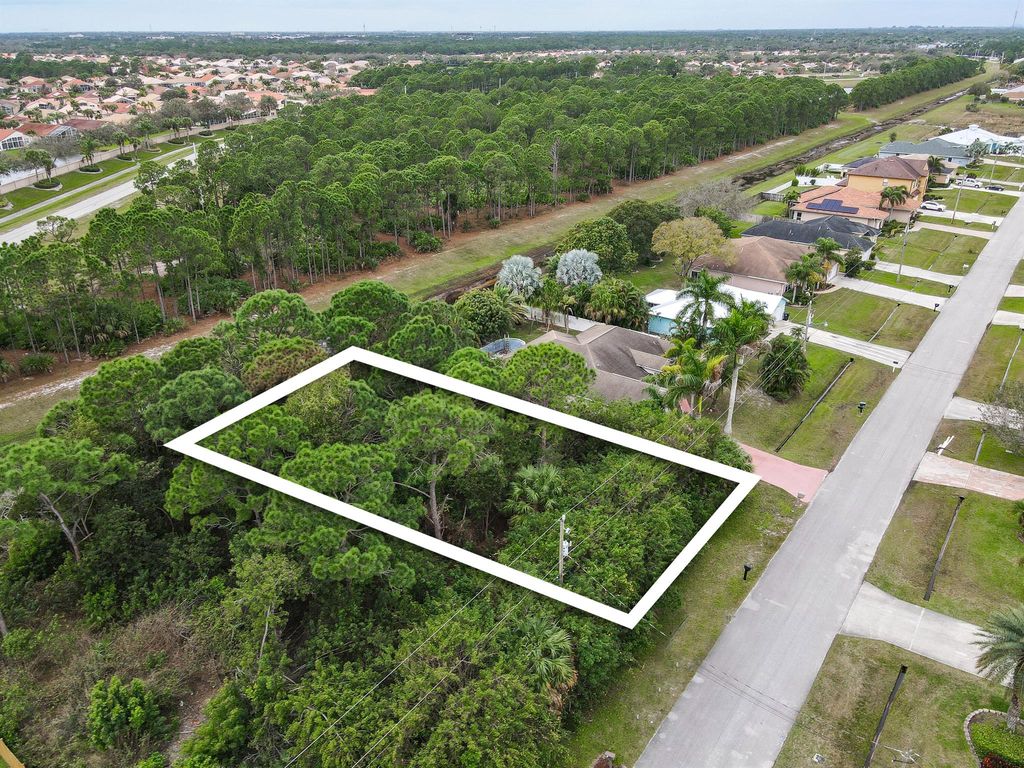 Photo of 5819 NW Zenith Drive, Port Saint Lucie, FL 34986 (MLS # R10953102)