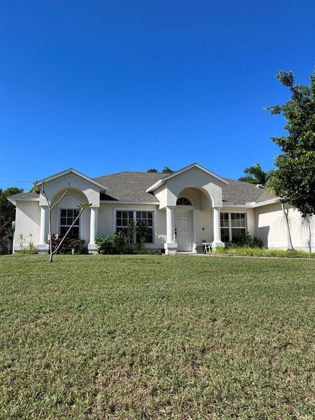 Photo of 1002 SW Eureka Avenue, Port St Lucie, FL 34953 (MLS # R10882744)