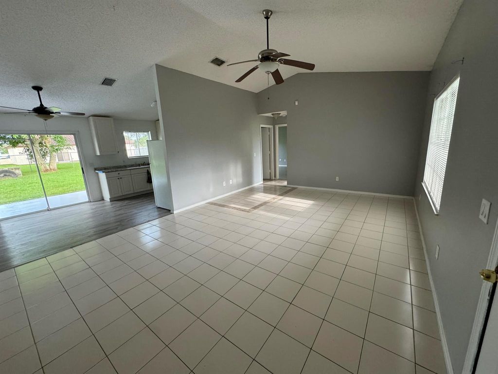 Photo of 109 SW Covington Road, Port Saint Lucie, FL 34953 (MLS # R11019144)
