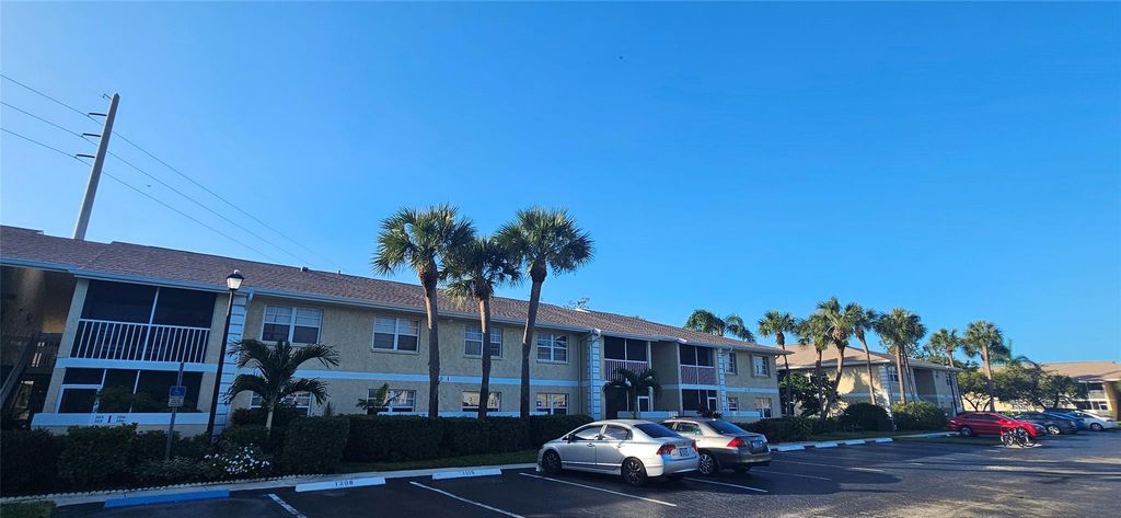 Photo of 1540 SE Royal Green Circle #206, Port Saint Lucie, FL 34952 (MLS # F10472545)