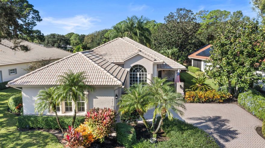 Beautiful Pool home with Lake View in ''Mystic Pines'' at PGA Village. This home offers fabulous Sunsets & tropical landscaping. Features CBS Construction, front gate entrance, tile flooring in main areas, vaulted ceilings, updated lights & fans, Plantation Shutters & IMPACT HURRICANE WINDOWS. Hosts 2 BR's, Large Den, 2 BA's, 2 Car Garage & Golf cart negotiable. Stunning Eat in Updated Kitchen boasts gorgeous quartz counter tops & backsplash, stainless steel appliances, wine cooler, under counter lighting & Island. Split floor plan with spacious Master Suite, sitting area overlooking the lake, walk in closets with built in's, decorative fireplace & Master Bath w/ LG shower & Roman Tub. Screen enclosed heated pool w/ new pump & heater, waterfall pond & summer kitchen. Perfect To entertain!