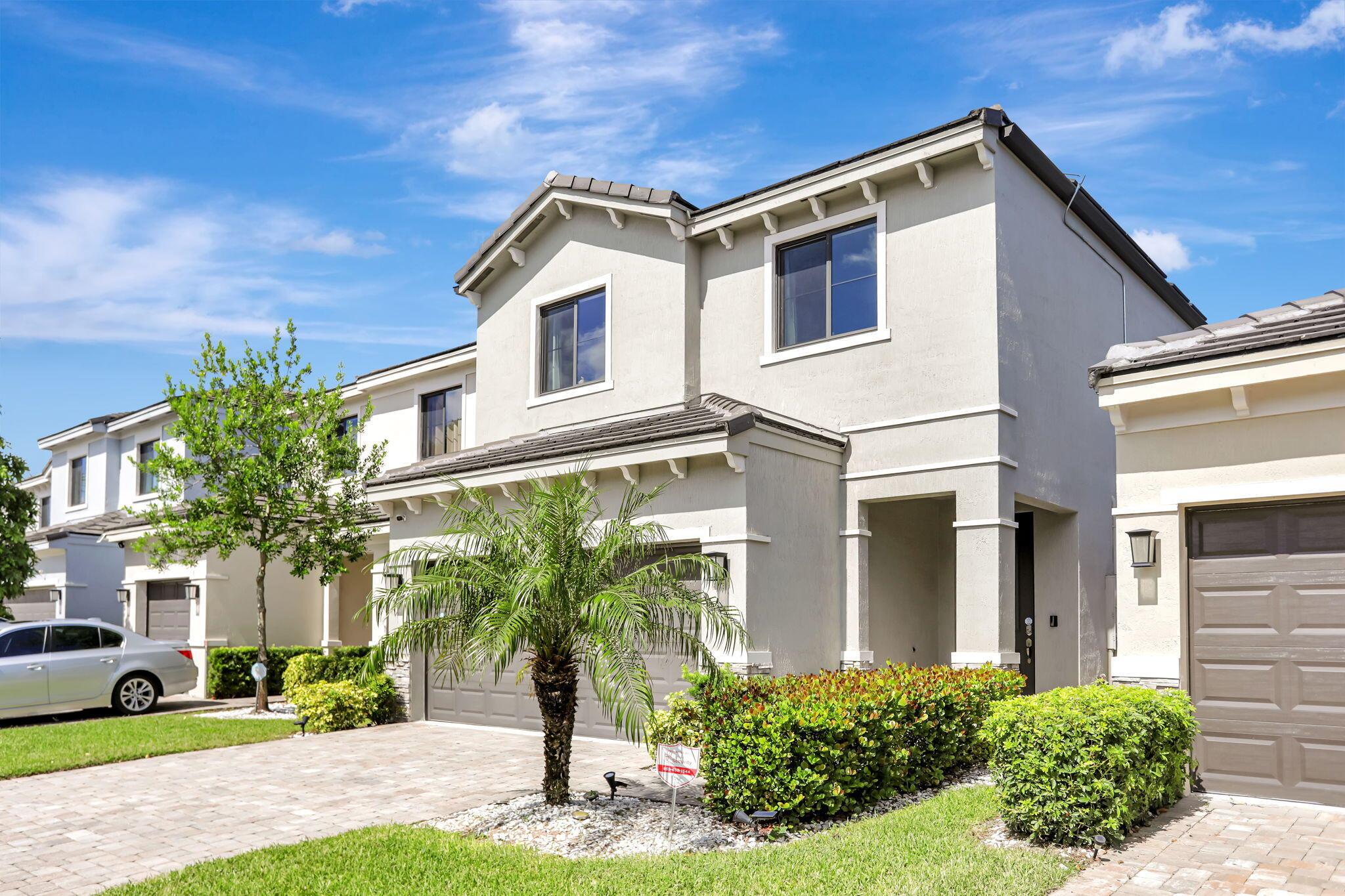 Rare opportunity to own one of the largest and most upgraded two stories models (EBB TIDE), built in 2020, located in the beautiful and gated community of Vantage at Palm Aire. Over 3000 SQFT, 3 bedrooms, 2 1/2 bathrooms with a huge loft with vaulted ceiling that can be converted into a 4th bedroom and a double car garage . Perfectly located next to the Turnpike, two miles from I95 and 6 miles from the beach, this property features, hurricane impact windows and doors, solar panels that eliminates the electric bill, gourmet kitchen with kitchen island, finger proof stainless steel appliances, cooktop, double oven, soft close cabinets and drawers, quartz counter tops, double sinks in both full bathrooms, tiles and laminates through out the house, covered and screened patio on the first f