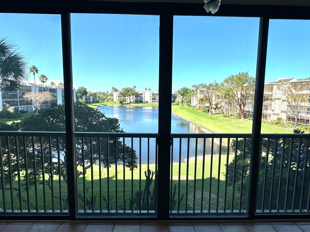Photo of 14460 Strathmore Lane #306, Delray Beach, FL 33446 (MLS # B26070203)