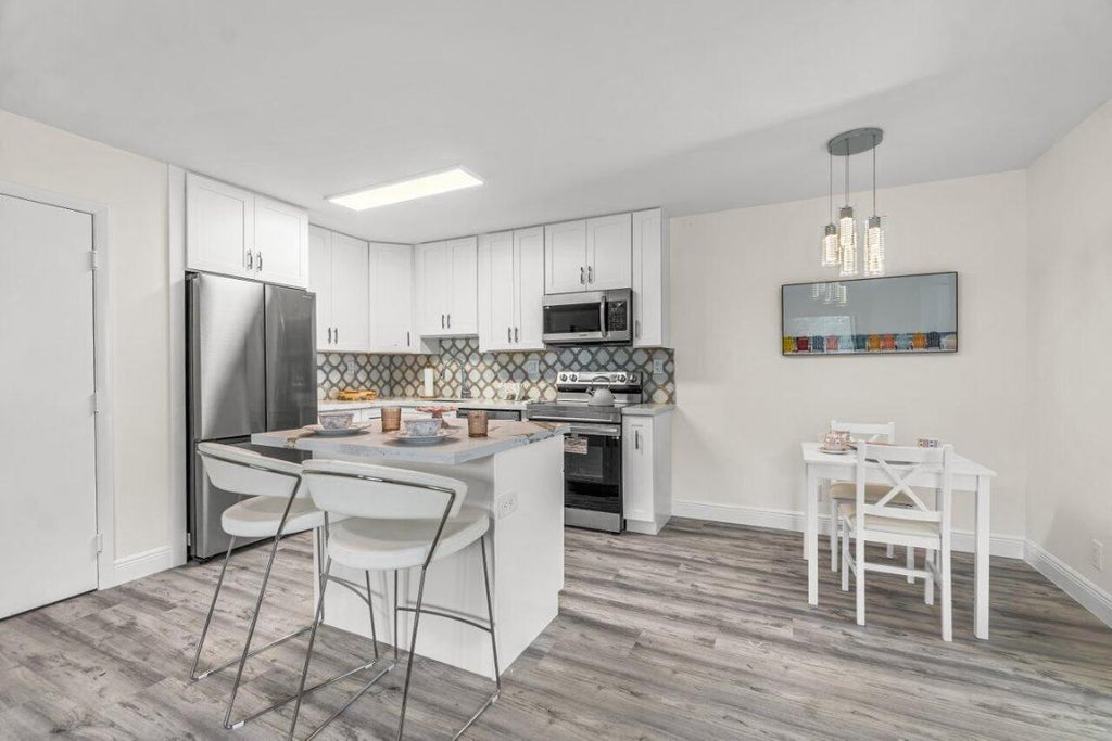 Photo of 15492 Lakes Of Delray Boulevard #107, Delray Beach, FL 33484 (MLS # R10964757)
