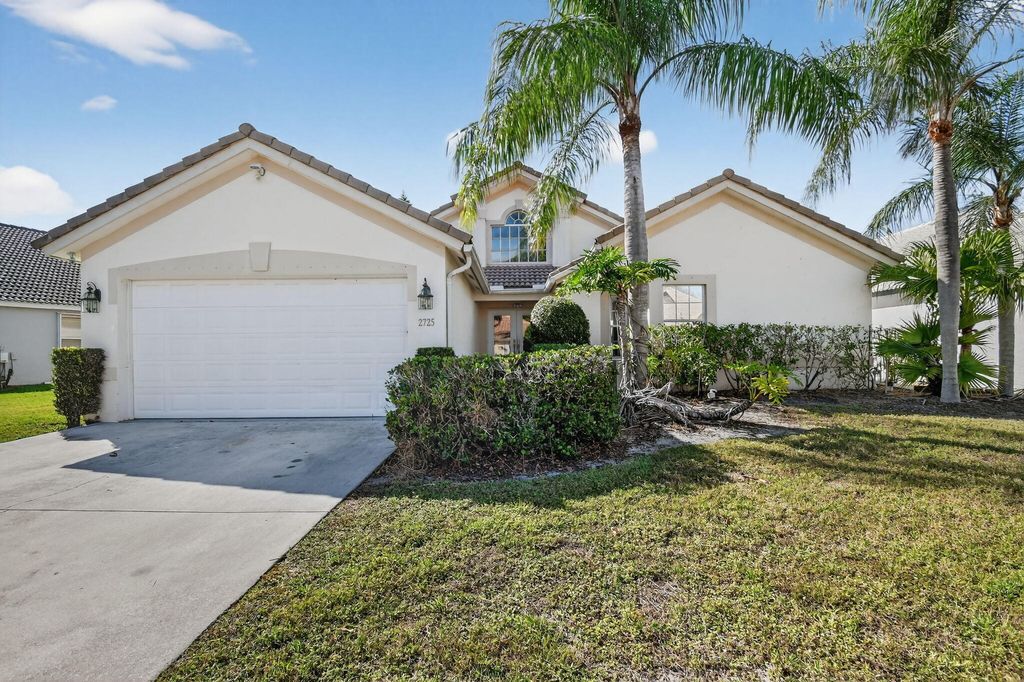 Photo of 2725 Pointe Circle, Greenacres, FL 33413 (MLS # B26014125)