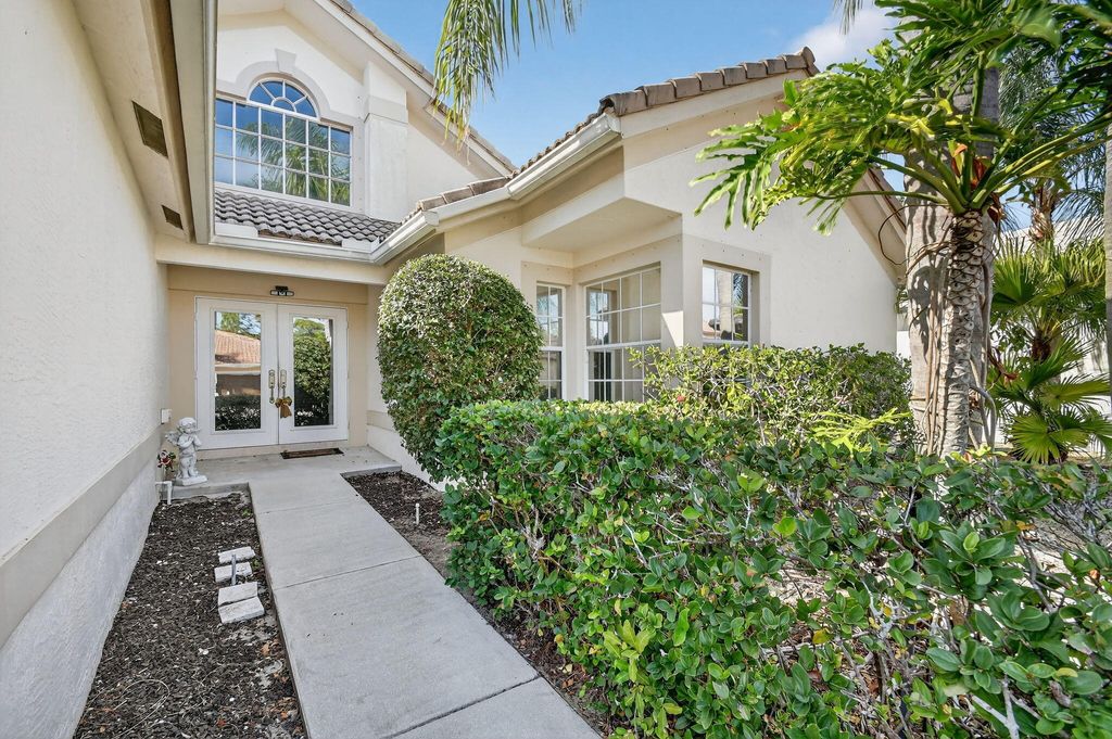 Photo of 2725 Pointe Circle, Greenacres, FL 33413 (MLS # B26014125)