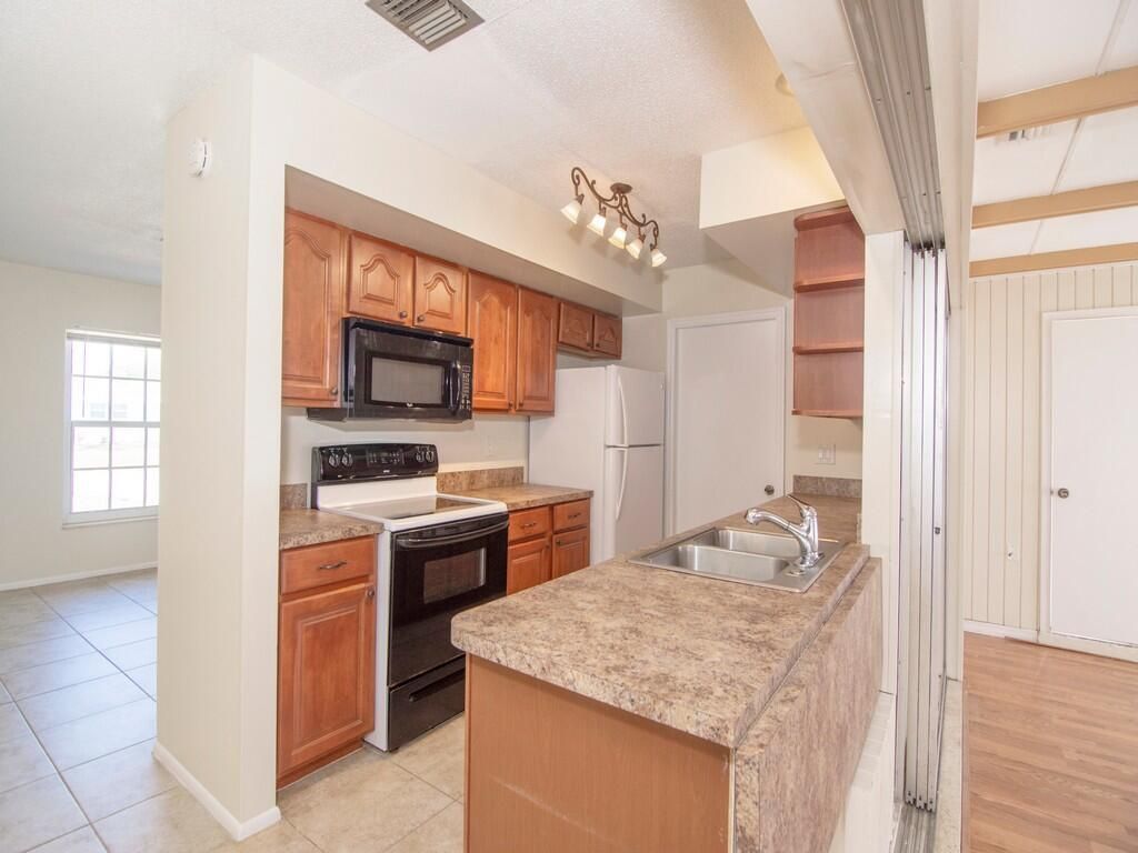 Photo of 457 SE Calmoso Drive, Port Saint Lucie, FL 34983 (MLS # R11041181)