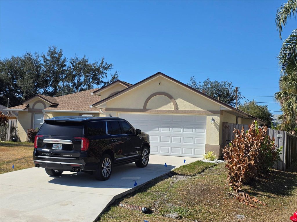 Photo of 4525 NW Glazbrook Street, Port Saint Lucie, FL 34983 (MLS # F10552291)