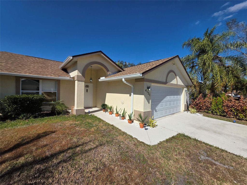 Photo of 4525 NW Glazbrook Street, Port Saint Lucie, FL 34983 (MLS # F10552291)