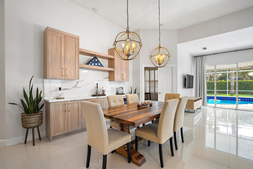 Photo of 297 Kelsey Park Circle, Palm Beach Gardens, FL 33410 (MLS # R11109477)