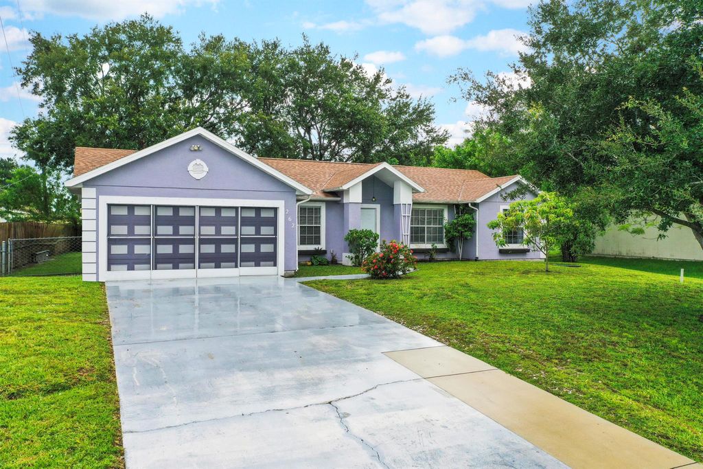 Photo of 262 NW Archer Avenue, Port Saint Lucie, FL 34983 (MLS # R11118691)