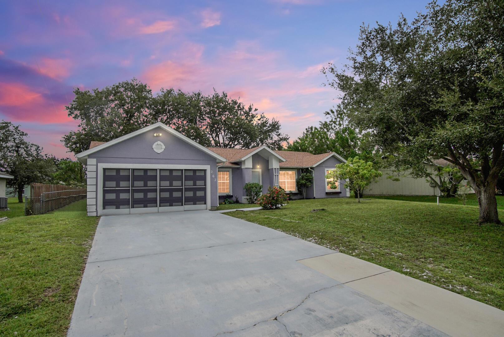 NEW ROOF. This charming 3-bedroom, 2-bathroom home with a versatile office/den offers comfort, convenience, and incredible value. Nestled in a peaceful neighborhood just minutes from the Turnpike and vibrant St. Lucie West, you'll enjoy easy access to shopping, dining, and entertainment.The spacious backyard provides ample room to design your dream pool oasis perfect for relaxing or entertaining. Whether you're starting out, downsizing, or investing, this home is priced to sell and ready for its next chapter.