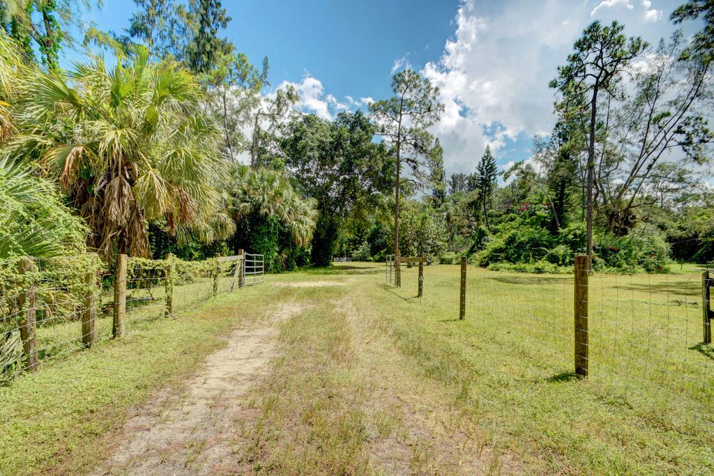 Photo of 852 Hyde Park Road, Loxahatchee Groves, FL 33470 (MLS # R10921616)