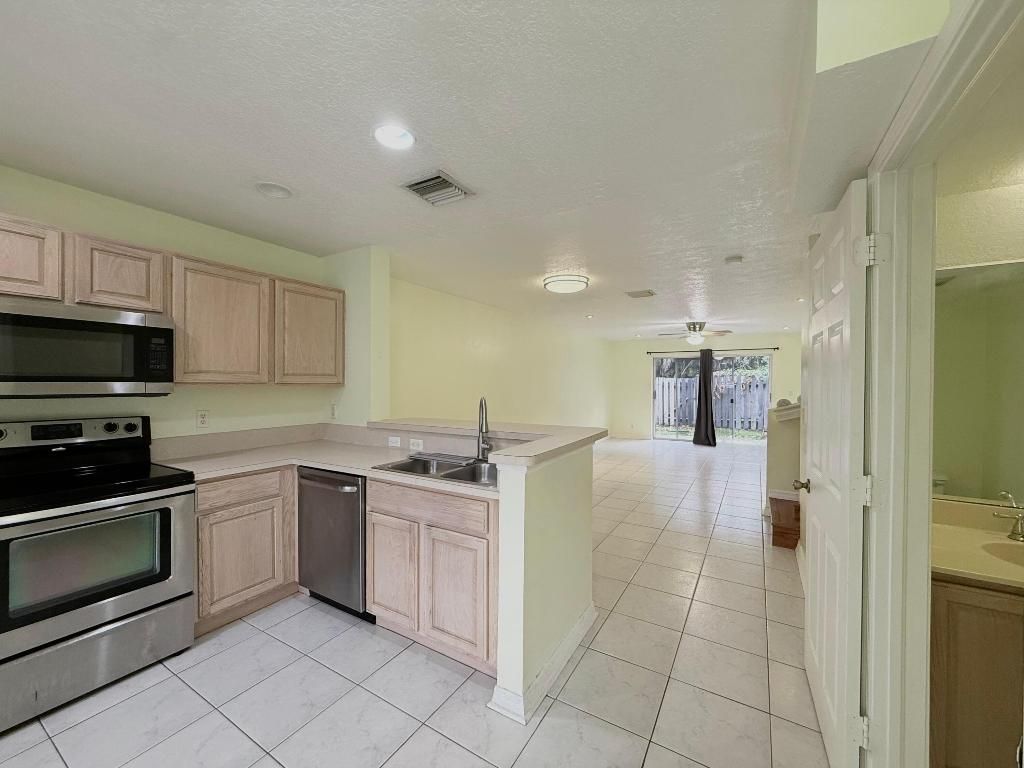Photo of 1910 Lakeview Drive W, Royal Palm Beach, FL 33411 (MLS # R11155822)