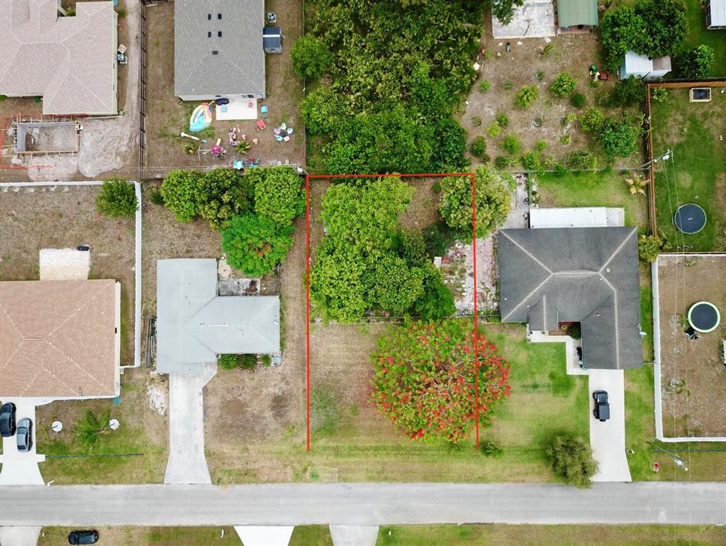 Photo of 413 SW Lakota Avenue, Port Saint Lucie, FL 34953 (MLS # R10720350)
