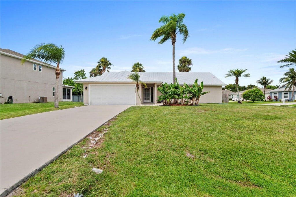 Photo of 2231 SW Abalon Circle, Port Saint Lucie, FL 34953 (MLS # R11102501)