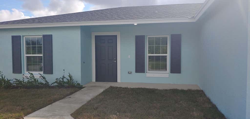 Photo of 682 SW PAAR Drive, Port Saint Lucie, FL 34953 (MLS # B26057840)