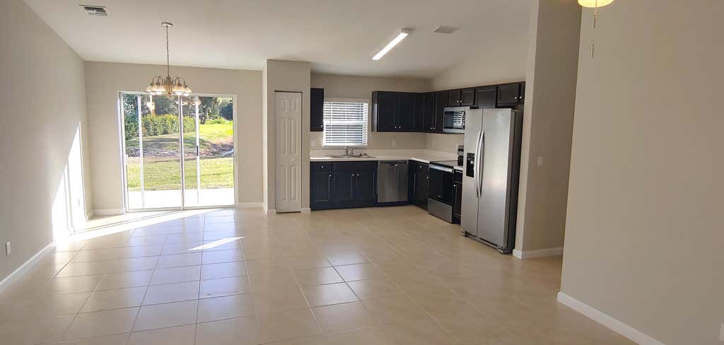 Photo of 682 SW PAAR Drive, Port Saint Lucie, FL 34953 (MLS # B26057840)