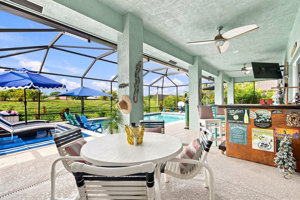 Photo of 408 SW ASTER Road, Port Saint Lucie, FL 34953 (MLS # B26059978)