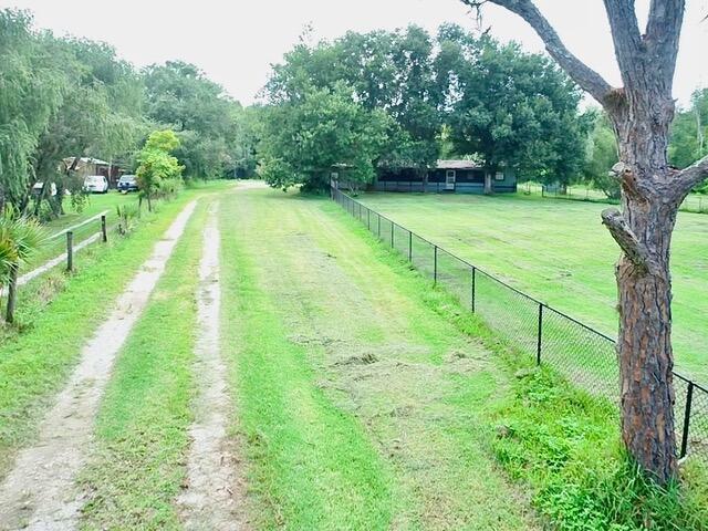 Welcome to this delightful 7.95 acre homestead, ready to welcome its new owner. It includes a state-of-the-art water softener, installed in 2023, along with a reverse osmosis water treatment system. The property also features updated flooring and sub-flooring, as well as a new garage door and opener. Furthermore, the barn is equipped for aquaculture, and the license can be smoothly transferred to the new owner. Bring your animals and start your garden in this beautiful space!