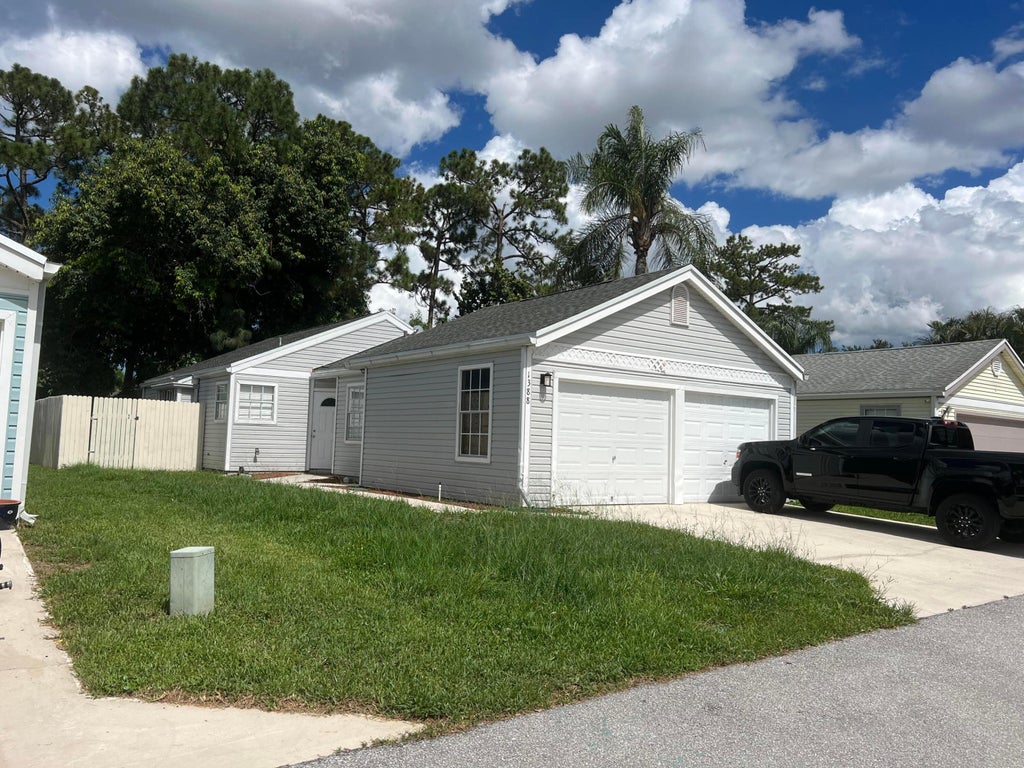 Photo of 1388 Amaryllis Lane E, West Palm Beach, FL 33415 (MLS # R10986116)