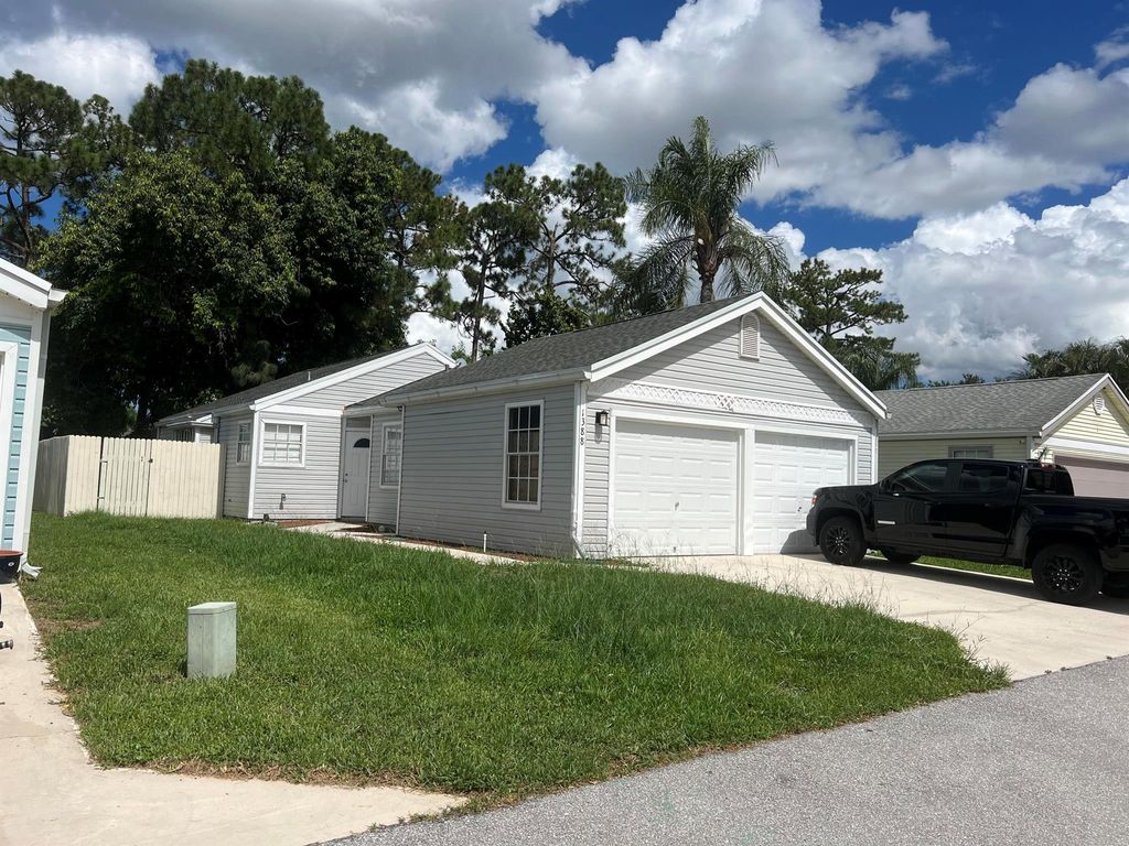 Photo of 1388 Amaryllis Lane E, West Palm Beach, FL 33415 (MLS # R10986116)