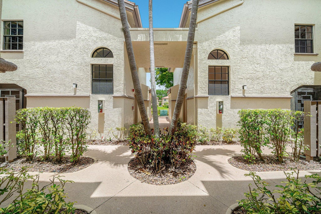 Photo of 5115 Europa Drive #L, Boynton Beach, FL 33437 (MLS # B26058227)