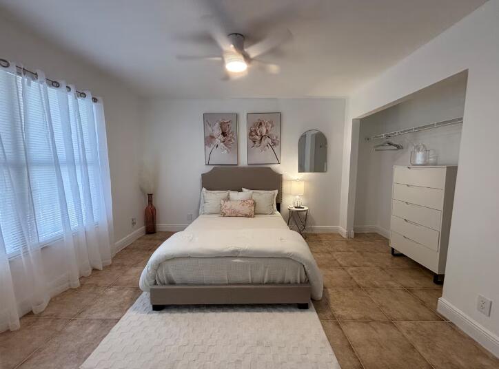 Photo of 1445 LAKE CRYSTAL Drive #E, West Palm Beach, FL 33411 (MLS # B26074690)