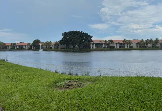 Photo of 1445 LAKE CRYSTAL Drive #E, West Palm Beach, FL 33411 (MLS # B26074690)