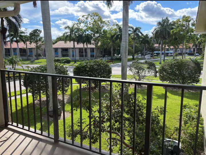 Photo of 1445 LAKE CRYSTAL Drive #E, West Palm Beach, FL 33411 (MLS # B26074690)