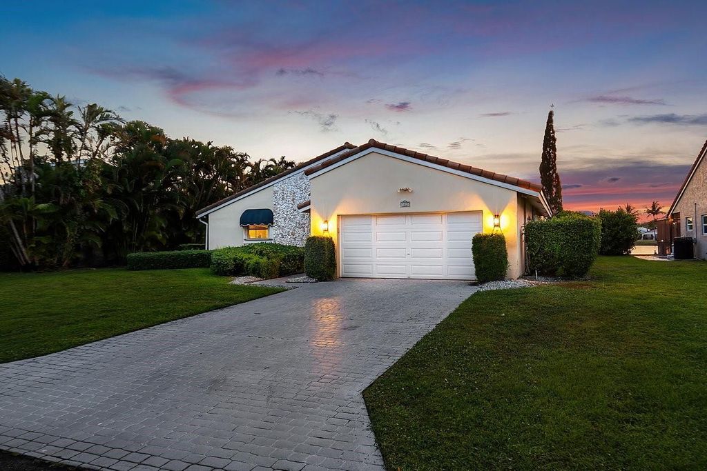 Photo of 7025 NW 2nd Terrace, Boca Raton, FL 33487 (MLS # F10499604)
